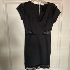 Little black dress, bodycon with lace cut outs
